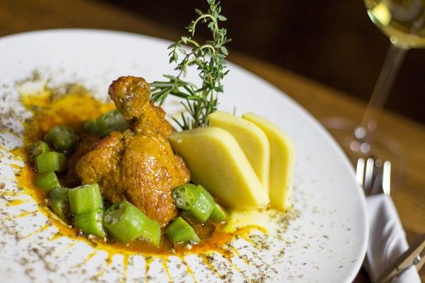 Frango com quiabo. Sautéed chicken on the bone served with okra and polenta.