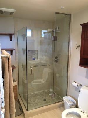 1/2 frameless shower enclosure w/ brushed nickel hardware