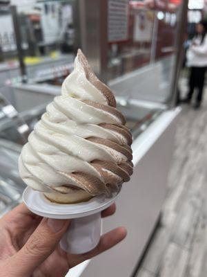 Chocolate and vanilla soft serve swirl