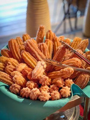 Warm Churros served with chocolate and cajeta sauces - a brunch favorite!