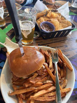 Burger, fries, beer, and chicken fajita nachos