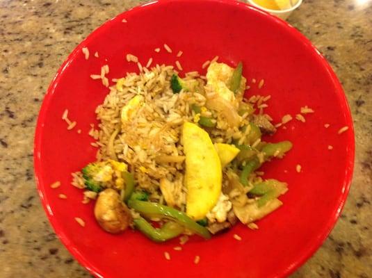 Hibachi station: rice, egg, squash, onion, bell pepper, mushroom, broccoli, steak cubes and soy sauce