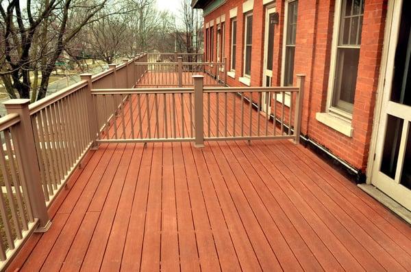 Tilden repaired the flat roof on this porch top before we installed the new composite deck.