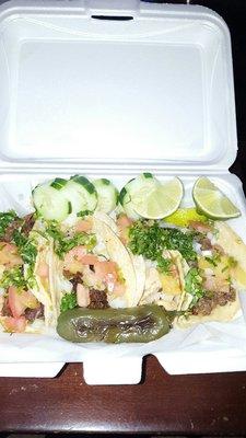 Left to Right: Barbacoa, Chorizo, Chicken, and Steak. Mexican style with added tomato. So much flavor!