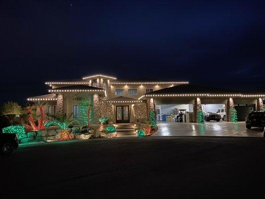 C9's all the way around this beautiful home, along with red/greed LEDs on every tree around the property