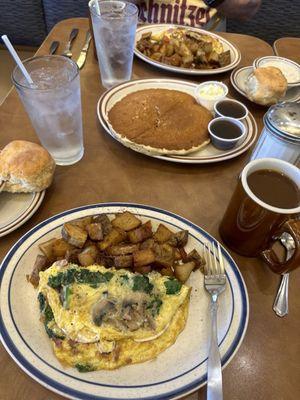 Spinach and ham omelette with potatoes for me. Husband had omelette as well. We shared the giant pancake.  It was all delicious.