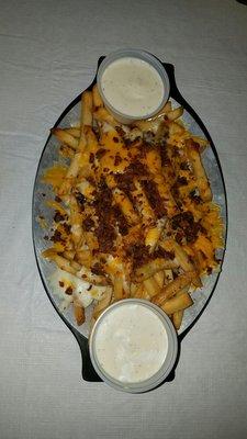 Buffalo Cheese Fries with Ranch sides.