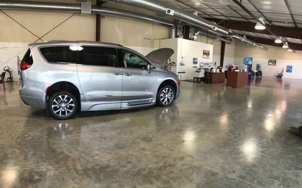 Inside showroom with large waiting area