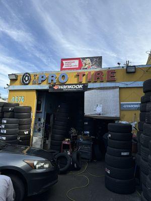 TM Pro Tire on Beverly Blvd. Look for the yellow fence attached to Serrano St. in front of the coin Laundry.