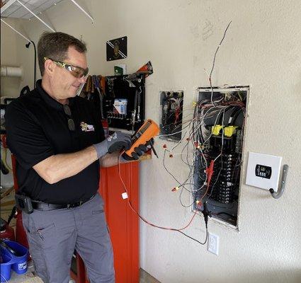 Mister Sparky Electrician Southlake working on electrical panel repair