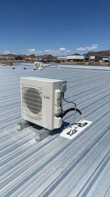 Trane/Mitsubishi mini split installed condenser installed on roof of customers storage unit.