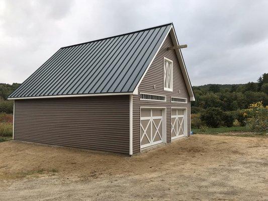 New garage we built with new standing seam roof we installed