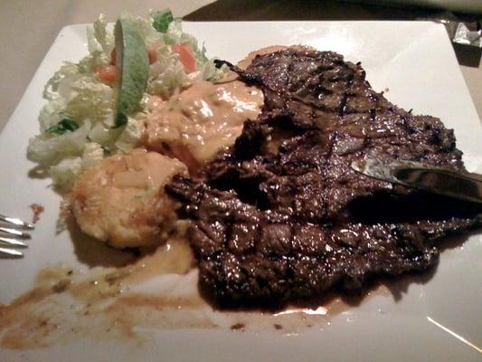 Skirt steak with potato pancakes and egg over easy