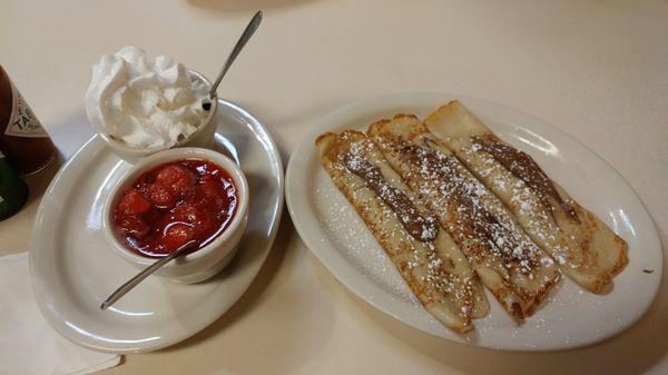 Nutella crepes, and they brought me some strawberries with it.  YUM.