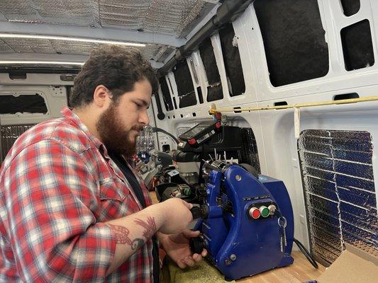 Ian cutting Mul-T-Lock keys