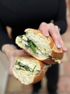 Grilled chicken, broccoli rabe, ricotta, asiago on a hero