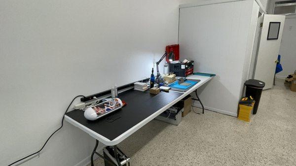 Work station to repair most any phone.