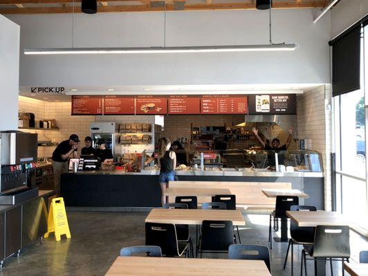 Counter Area with Cheerful, Efficient Employees