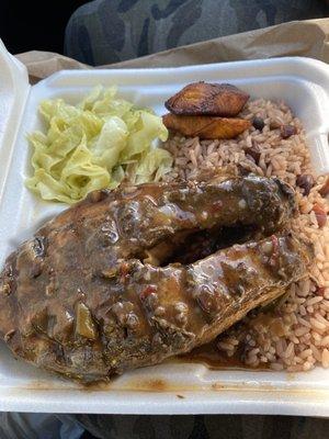 Curry Red Snapper,  red beans and rice, plantain, and cabbage.