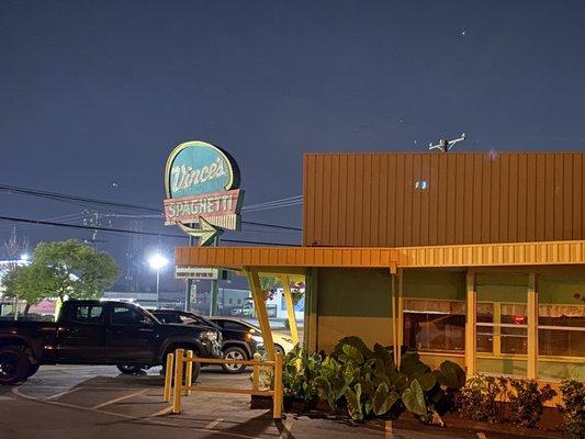 Front of store with sign