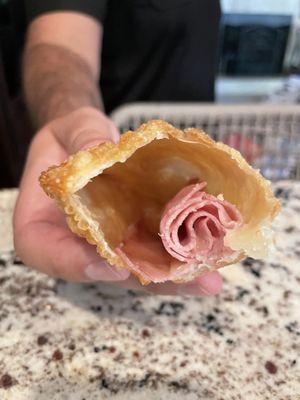 This is what they call a ham and cheese empanada.