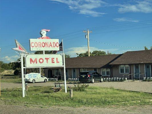 Bullet holes in the sign.