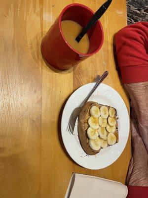 Coffee and Toast with Banana, peanut and honey.