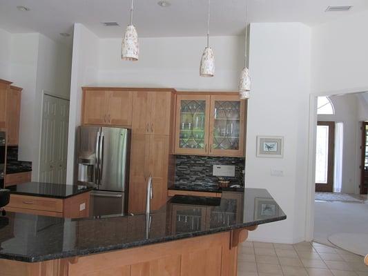 Full kitchen remodel. We installed new Bridgewood Cabinets in Shaker Style, done in a Maple wood and Finished in a Pecan stain.