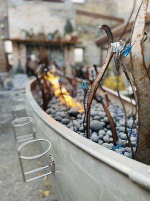 Exterior canoe fire pit