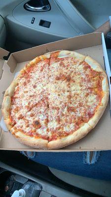 Delicious medium cheese pizza.