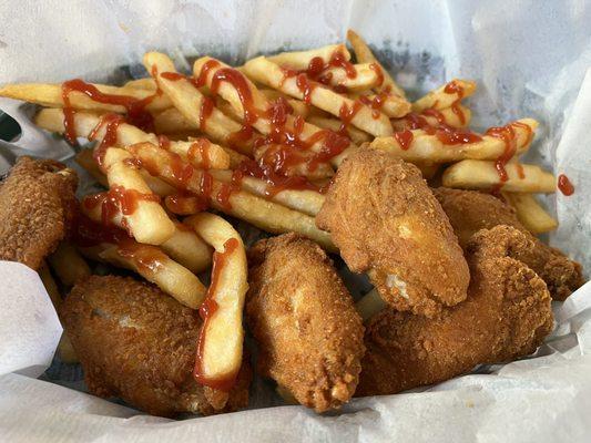 Chicken wings and fries