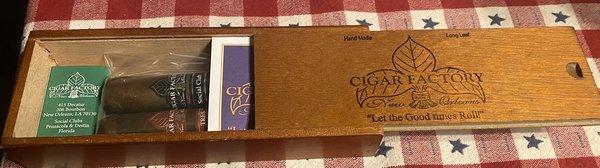 Cigars, matches, and wooden cigar box