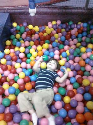 My son Gabriel in the ball pit at Galaxy Games and Golf on his first visit.