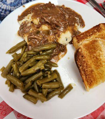 Beef Tips over mashed potatoes and green beans