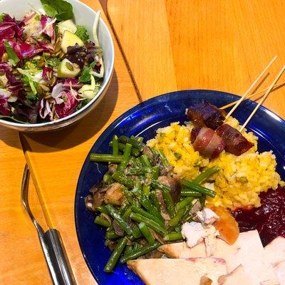 Thanksgiving meal kit. Kale and radicchio salad, pumpkin risotto, green bean and mushroom casserole, and bacon wrapped dates