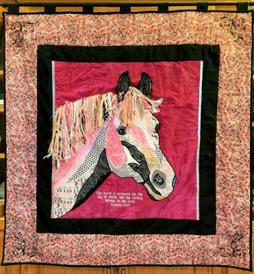 Art quilts with 32 different fibers in the mane.