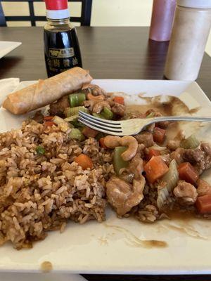 Cashew chicken-egg roll with fried rice.