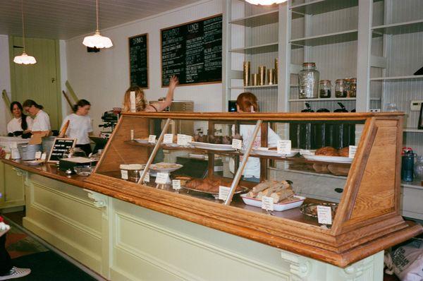 Our pastry case featuring homemade cookies, pastries, grab n go baguette sandwiches, and more