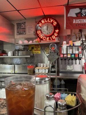 Sitting at the counter.