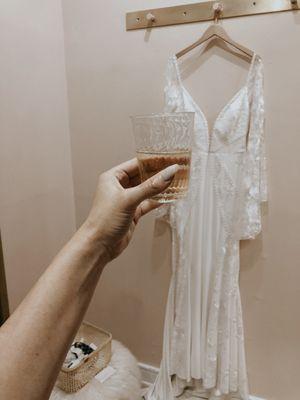 Champagne and trying on dresses !!