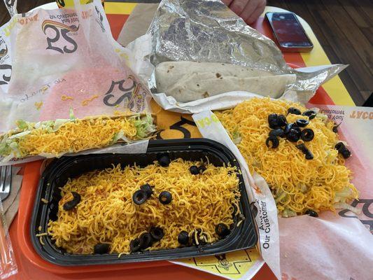 Super taco top left, super burrito top right, their version of an enchilada bottom left and tostada lower right