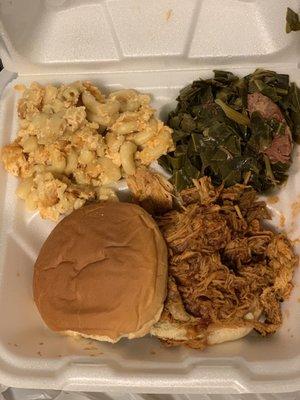 Pulled pork sandwich, macaroni, and collard greens.