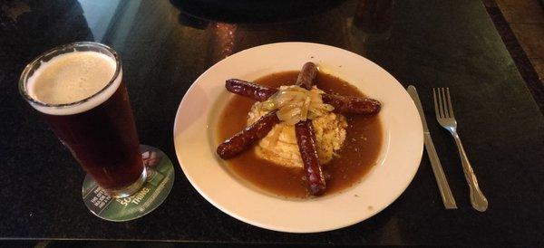 Bangers and mashed with gravy and onions. And of course a pint.