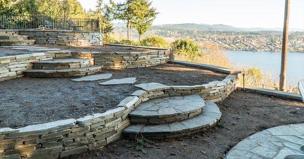 side view of the retaining walls and half moon steps