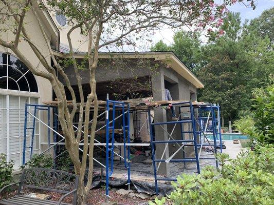 Stucco application on an outdoor kitchen extension