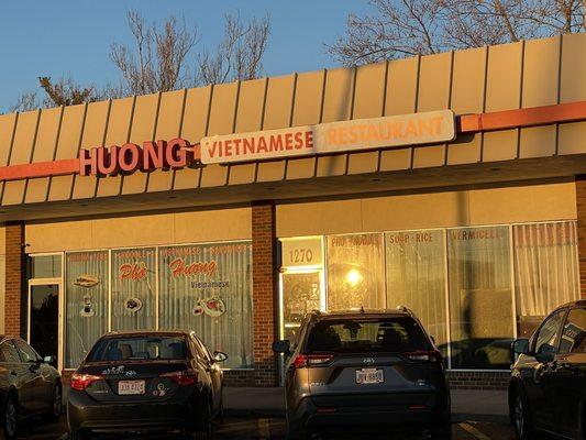 Sunset over the delicious Huong sign