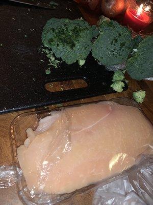 No sell by sticker on the slimy " Chicken Breast (Fresh) (1.5-2 lbs.) " & rotten " Broccoli (Per Bunch)"