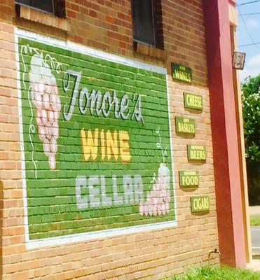 signage outside on the brick wall