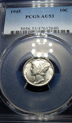 This is a 1945 P Mercury Dime. This coin is at least, a 64 when looking at it physically. However, they graded it at 53.