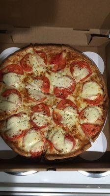 Large margahrita pizza. Good pizza with a great price.